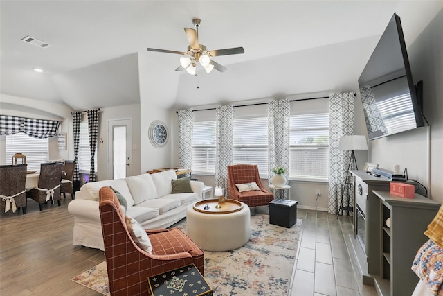 725 Sandy Chip Trl, Fort Worth, TX 76108 - living area with lofted ceiling, plenty of natural light, a ceiling fan, wood finished floors, and baseboards