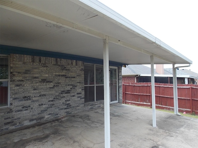 6107 Brookfall Dr, Arlington, TX 76018 - view of patio with fence