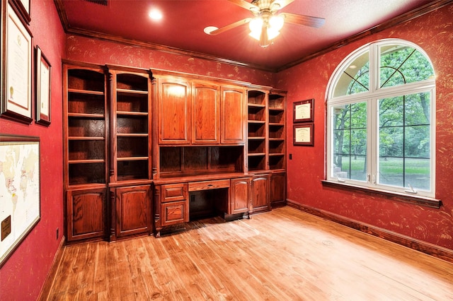 620 Timber Creek Cir, Stephenville, TX 76401 - unfurnished office with built in study area, light wood-style floors, a ceiling fan, healthy amount of natural light, and ornamental molding