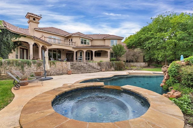 620 Timber Creek Cir, Stephenville, TX 76401 - view of swimming pool featuring a patio area, a pool with connected hot tub, and stairs