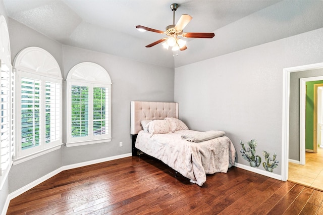 620 Timber Creek Cir, Stephenville, TX 76401 - bedroom featuring hardwood / wood-style flooring, baseboards, and ceiling fan