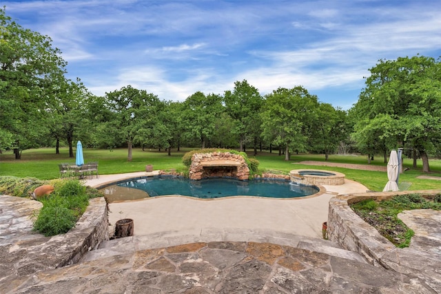 620 Timber Creek Cir, Stephenville, TX 76401 - view of swimming pool with a patio, a yard, view of wooded area, and a pool with connected hot tub