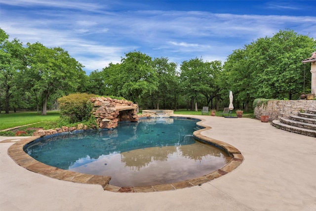 620 Timber Creek Cir, Stephenville, TX 76401 - view of pool with a patio, a pool with connected hot tub, and view of scattered trees