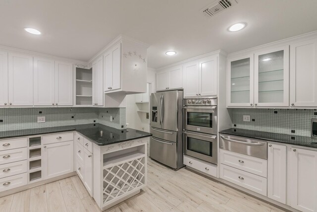 4107 Crossgate Ct, Arlington, TX 76016 - kitchen featuring stainless steel appliances, a warming drawer, white cabinets, and recessed lighting