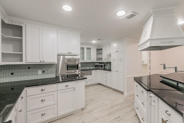 4107 Crossgate Ct, Arlington, TX 76016 - kitchen with open shelves, appliances with stainless steel finishes, premium range hood, white cabinetry, and recessed lighting