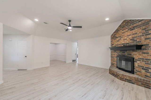 4107 Crossgate Ct, Arlington, TX 76016 - unfurnished living room with ceiling fan, vaulted ceiling, light wood-style floors, a brick fireplace, and baseboards