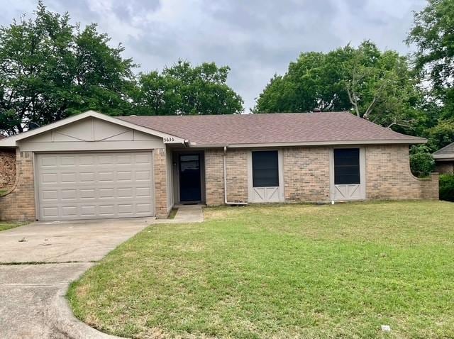 5636 Cherilee Ln, Haltom City, TX 76148 - ranch-style home with driveway, a garage, a front yard, brick siding, and roof with shingles