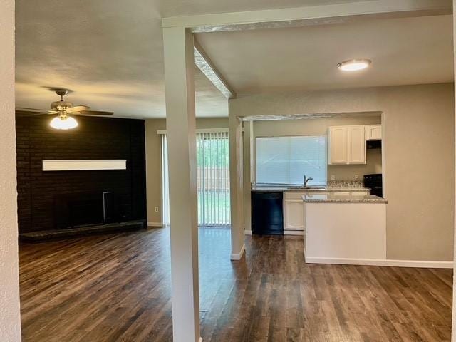 5636 Cherilee Ln, Haltom City, TX 76148 - kitchen with dishwasher, white cabinets, dark wood-style flooring, and open floor plan