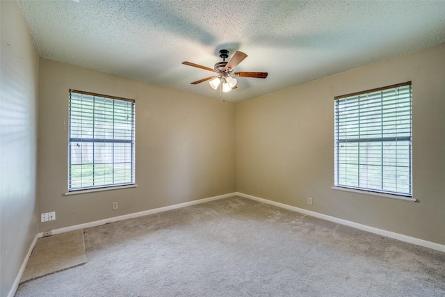 146 Circle Dr, Denison, TX 75021 - carpeted empty room featuring ceiling fan, baseboards, and a textured ceiling