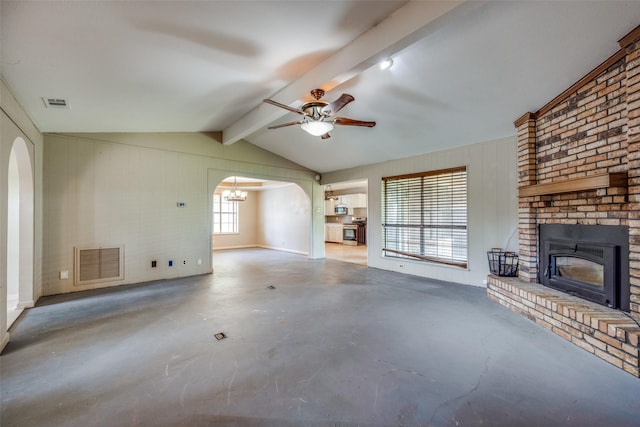 146 Circle Dr, Denison, TX 75021 - unfurnished living room featuring arched walkways, a fireplace, ceiling fan, and concrete floors