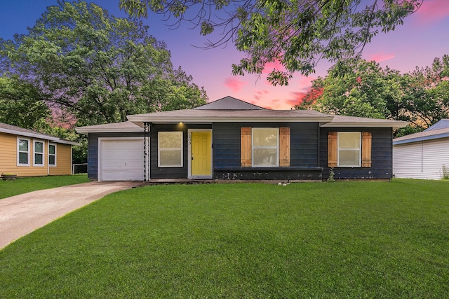 1209 Ralph St, Grand Prairie, TX 75051 - view of front facade with concrete driveway, a front yard, and a garage