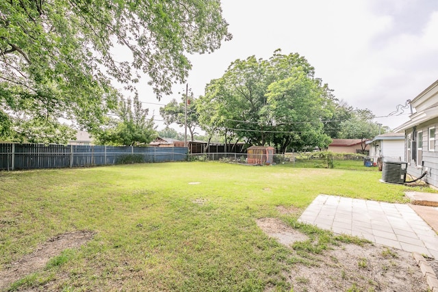 1209 Ralph St, Grand Prairie, TX 75051 - view of yard with central air condition unit and a patio area
