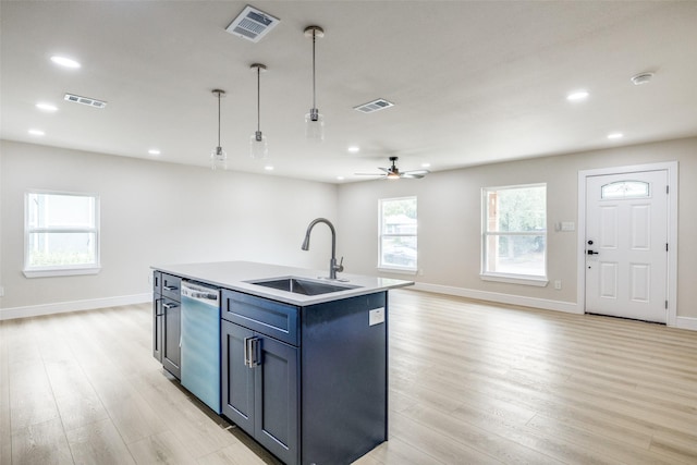 1218 Ralph St, Grand Prairie, TX 75051 - kitchen featuring dishwasher, light wood-style flooring, an island with sink, a ceiling fan, and recessed lighting