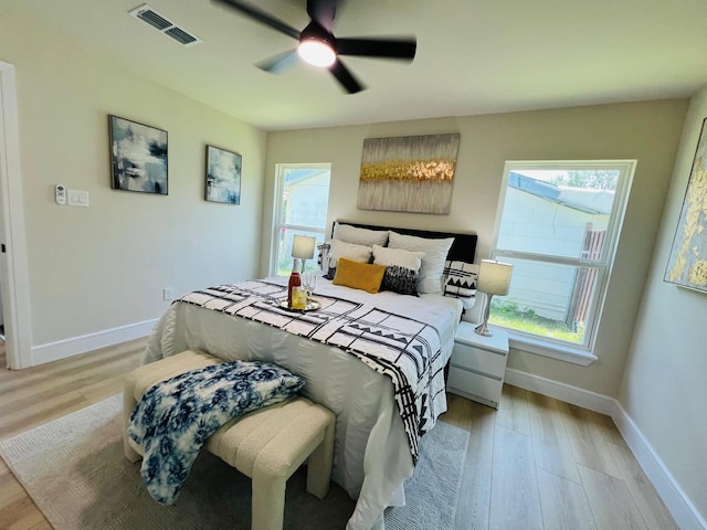 1218 Ralph St, Grand Prairie, TX 75051 - bedroom with light wood-type flooring and ceiling fan