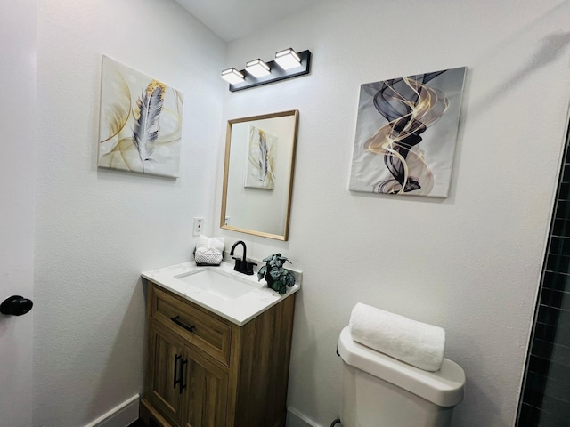 1218 Ralph St, Grand Prairie, TX 75051 - bathroom with toilet and vanity