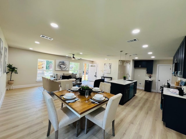 1218 Ralph St, Grand Prairie, TX 75051 - dining space featuring light wood-type flooring, ceiling fan, and recessed lighting