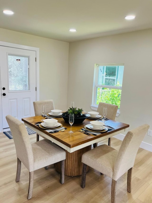 1218 Ralph St, Grand Prairie, TX 75051 - dining room with light wood-style floors and recessed lighting