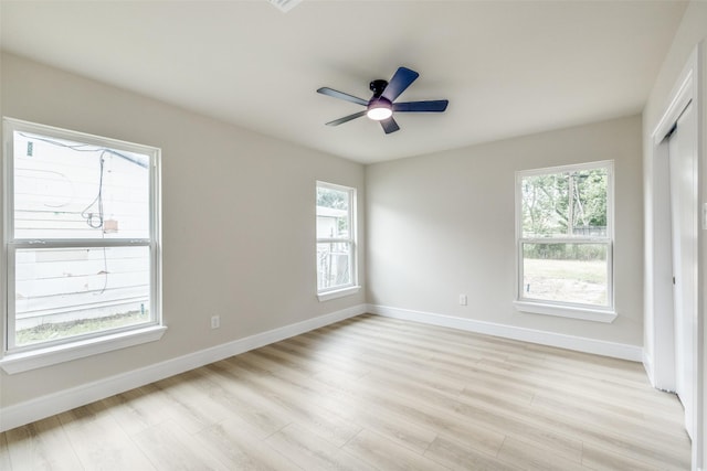 1218 Ralph St, Grand Prairie, TX 75051 - spare room featuring light wood finished floors, baseboards, and a ceiling fan