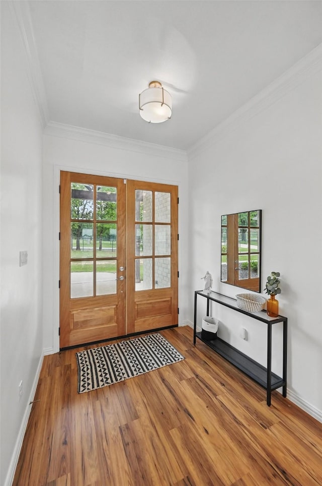 917 County Road 914, Burleson, TX 76028 - entryway with wood finished floors, ornamental molding, french doors, and baseboards