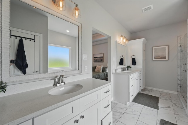 917 County Road 914, Burleson, TX 76028 - full bath with marble finish flooring, two vanities, a stall shower, ensuite bath, and baseboards