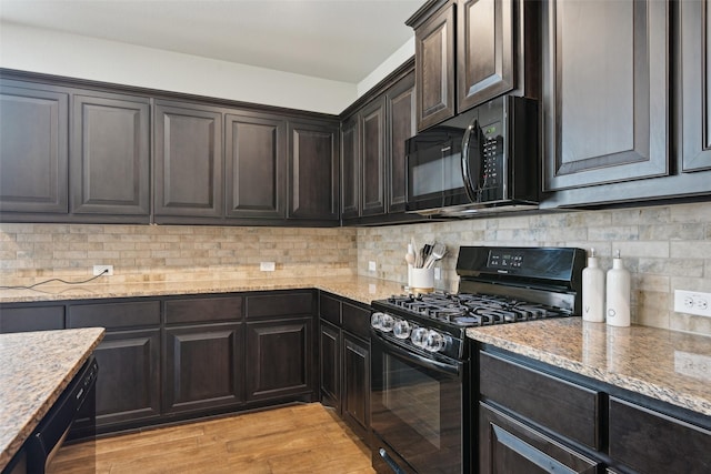 3454 Eloise Ln, Krum, TX 76249 - kitchen featuring black appliances, light stone counters, backsplash, light wood-type flooring, and dark brown cabinets