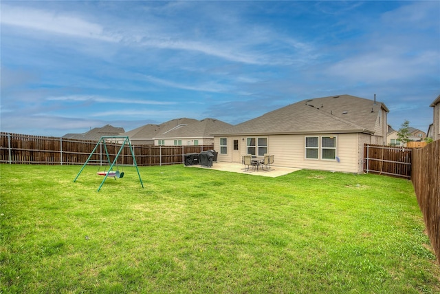 1908 Damianita Dr, Royse City, TX 75189 - back of property featuring a patio and a playground