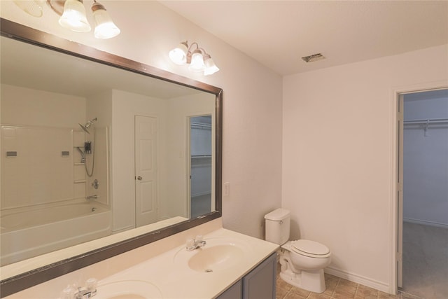 1300 Wind Star Way, Fort Worth, TX 76108 - full bathroom featuring double vanity, toilet, a spacious closet,  shower combination, and tile patterned floors