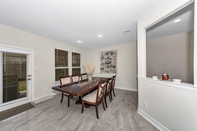 8109 Brahmin Ct, Fort Worth, TX 76131 - dining space featuring baseboards, marble look tiles, and recessed lighting