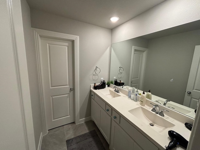 3121 Althea St, Mckinney, TX 75071 - full bath featuring double vanity, tile patterned floors, and baseboards