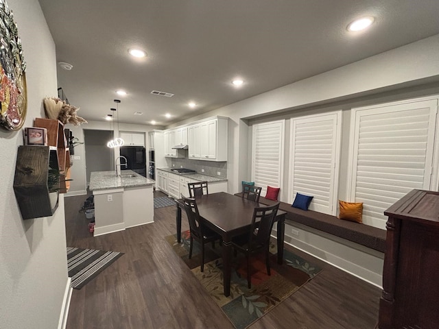 3121 Althea St, Mckinney, TX 75071 - dining space featuring dark wood-style floors and recessed lighting