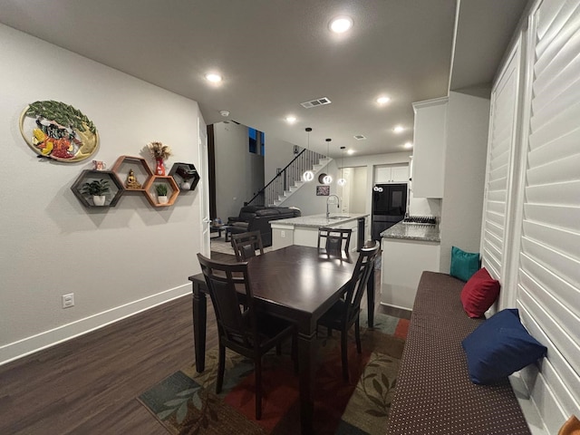 3121 Althea St, Mckinney, TX 75071 - dining room with dark wood-style floors, stairs, recessed lighting, and baseboards