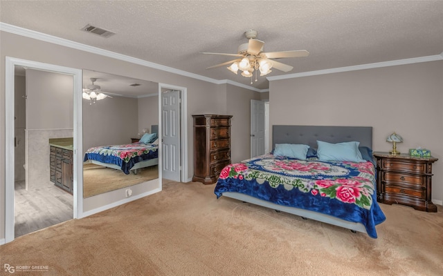 carpeted bedroom with crown molding, ceiling fan, baseboards, and a textured ceiling
