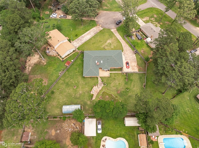 aerial overview of property's location with a pool area