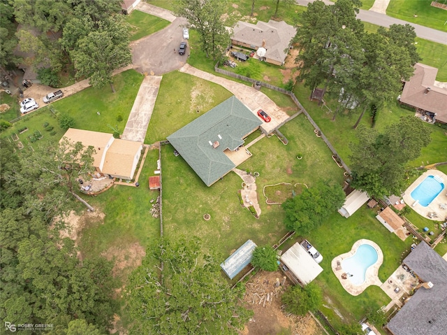 aerial overview of property's location featuring a pool area