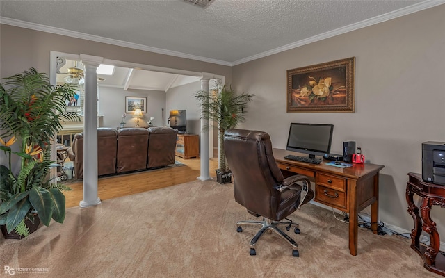 office area featuring ornate columns, carpet, crown molding, baseboards, and a textured ceiling
