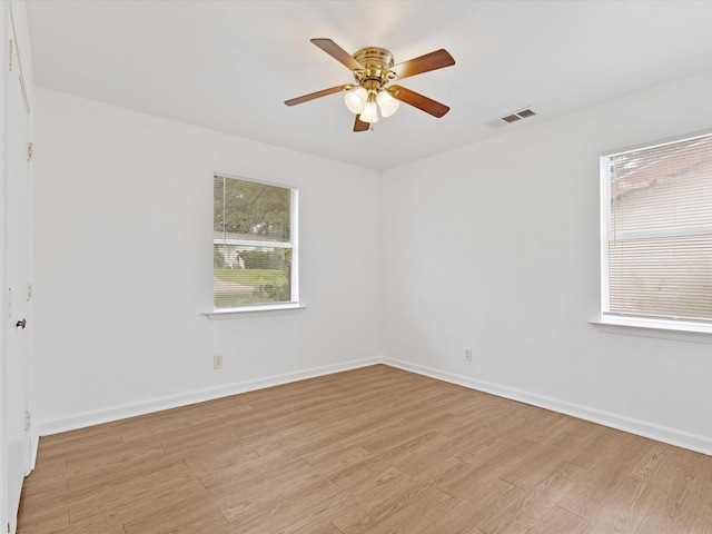 511 Wildwood Dr, Mesquite, TX 75149 - unfurnished room with light wood-style flooring, ceiling fan, and baseboards