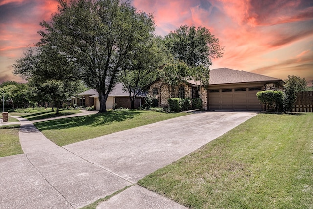 view of front facade with driveway and an attached garage