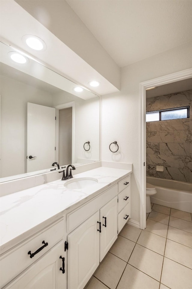 bathroom with toilet, vanity, tile patterned floors, shower / bath combination, and recessed lighting
