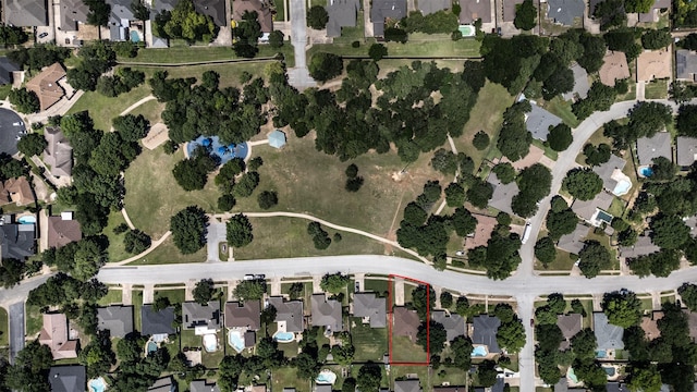 view of property location featuring property parcel outlined and nearby suburban area