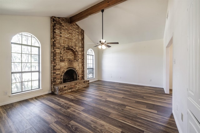 unfurnished living room featuring ceiling fan, dark wood-style floors, beam ceiling, baseboards, and high vaulted ceiling