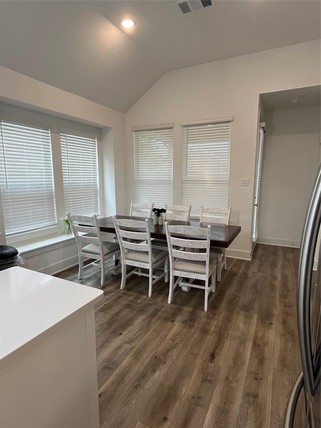 1812 Horseshoe Ln, Van Alstyne, TX 75495 - dining area with vaulted ceiling, dark wood-style flooring, baseboards, and recessed lighting