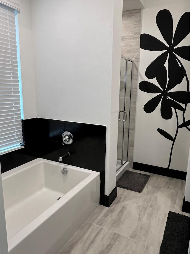 1812 Horseshoe Ln, Van Alstyne, TX 75495 - bathroom featuring a bath and a stall shower