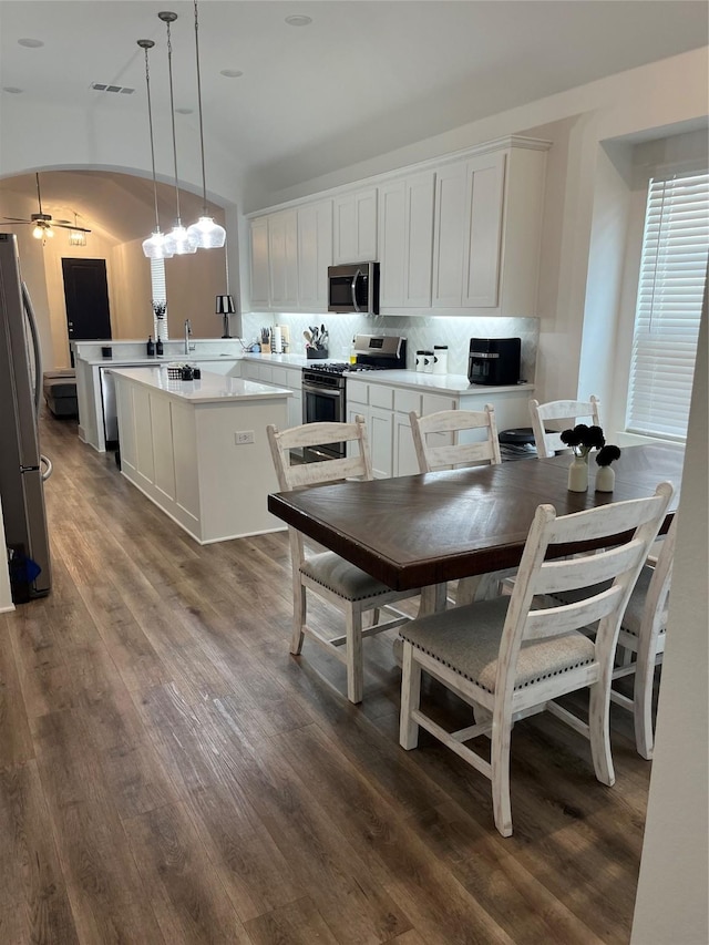 1812 Horseshoe Ln, Van Alstyne, TX 75495 - dining area with dark wood finished floors and ceiling fan