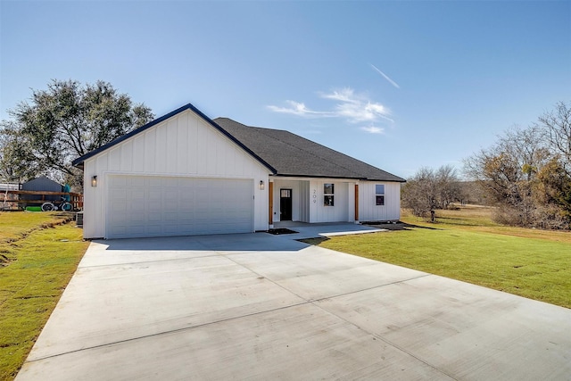 209 Lanai Dr, Runaway Bay, TX 76426 - modern farmhouse with an attached garage, concrete driveway, a front lawn, board and batten siding, and roof with shingles
