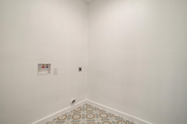 209 Lanai Dr, Runaway Bay, TX 76426 - clothes washing area with baseboards, washer hookup, and hookup for an electric dryer