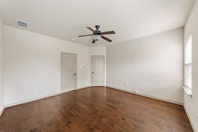 7941 Parkwood Blvd, Plano, TX 75024 - spare room featuring a ceiling fan, wood-type flooring, and baseboards