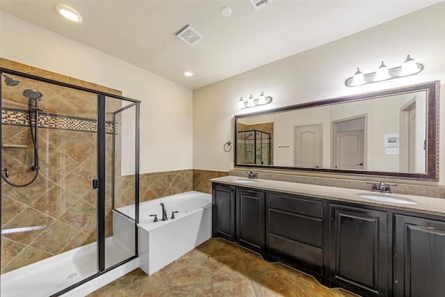 7941 Parkwood Blvd, Plano, TX 75024 - full bath featuring a bath, a stall shower, and double vanity