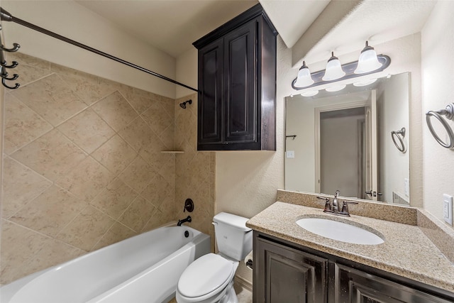 7941 Parkwood Blvd, Plano, TX 75024 - bathroom featuring washtub / shower combination, toilet, and vanity