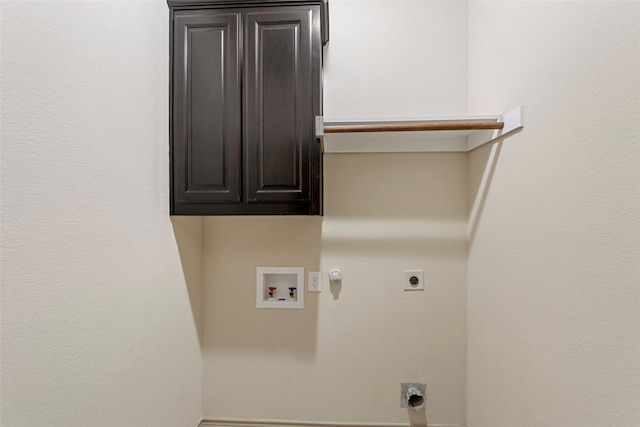 7941 Parkwood Blvd, Plano, TX 75024 - clothes washing area with hookup for an electric dryer, hookup for a washing machine, hookup for a gas dryer, and cabinet space