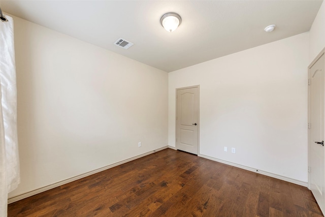 7941 Parkwood Blvd, Plano, TX 75024 - empty room featuring dark wood finished floors and baseboards